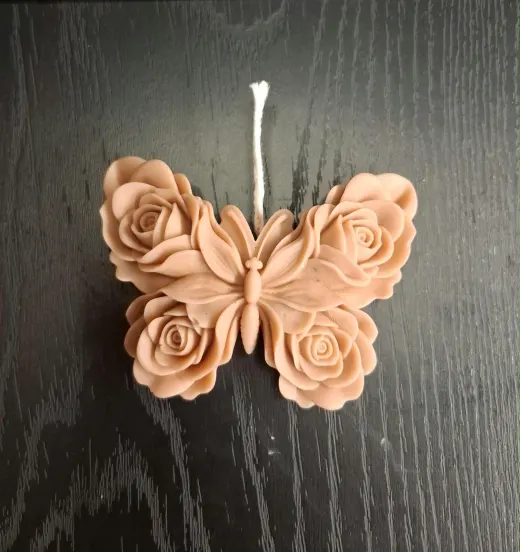 Vela mariposa rosas